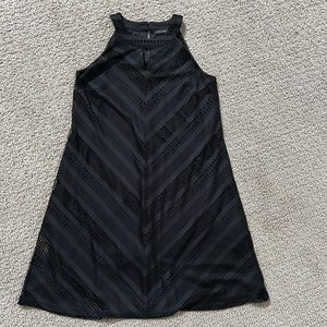 Black dress with peep hole neckline